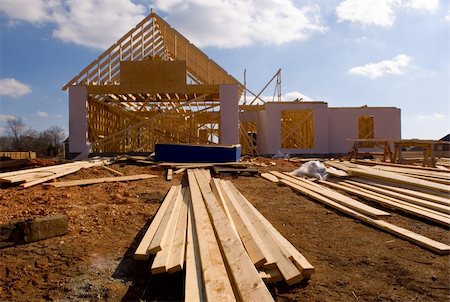 roof hammer - New home under construction with wood, trusses and supplies Stock Photo - Budget Royalty-Free & Subscription, Code: 400-04440832