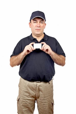 A courier handing a blank card over a white background Stock Photo - Budget Royalty-Free & Subscription, Code: 400-04440926