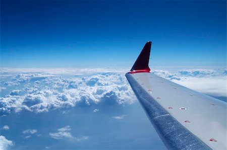 simsearch:400-04378611,k - airplane wing on the beautiful blue sky background Stock Photo - Budget Royalty-Free & Subscription, Code: 400-04441917