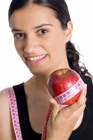 girl, apple and measuring tape Stock Photo - Budget Royalty-Free & Subscription, Code: 400-04441973