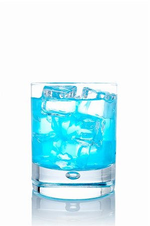 simsearch:400-04046933,k - Glass of blue paradise cocktail with ice cubes reflected on white background Foto de stock - Super Valor sin royalties y Suscripción, Código: 400-04442615