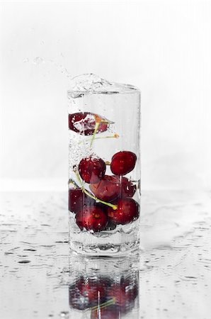 a glass of juice in the cherry pile Stock Photo - Budget Royalty-Free & Subscription, Code: 400-04442760