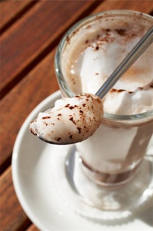 simsearch:400-04977109,k - Closeup of cafe latte in tall glass, with a long spoon lying on top of it with foam Foto de stock - Super Valor sin royalties y Suscripción, Código: 400-04442895