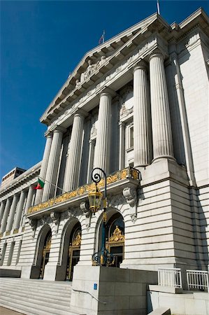 san francisco city hall - The City Hall of San Francisco California, opened in 1915, in its open space area in the city's Civic Center, is a Beaux-Arts monument to the brief "City Beautiful" movement that epitomized the high-minded American Renaissance of the period 1880-1917. The present building is actually a replacement for an earlier City Hall that was completely destroyed during the 1906 Earthquake. Stock Photo - Budget Royalty-Free & Subscription, Code: 400-04442915