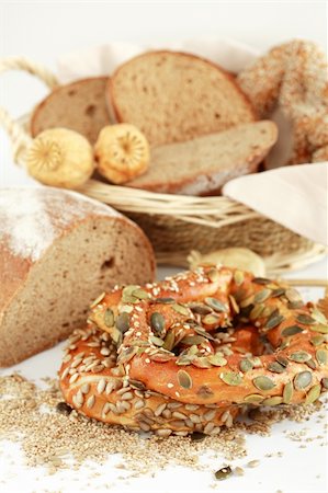 people eating bagels - Different pastries and bread Photographie de stock - Aubaine LD & Abonnement, Code: 400-04442948