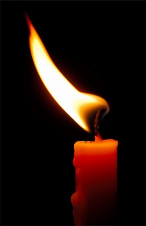 Image shows a red candle with a shimmering flame Stock Photo - Budget Royalty-Free & Subscription, Code: 400-04443679