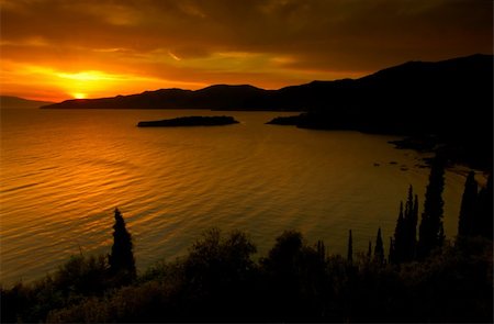 Picture shows a spectacular sunset over the bay of Kardamili, southern Greece Stock Photo - Budget Royalty-Free & Subscription, Code: 400-04443681