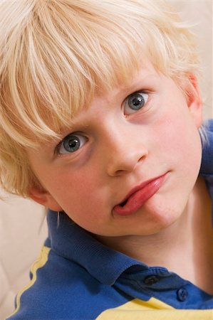Little boy making grimace (funny face) Stock Photo - Budget Royalty-Free & Subscription, Code: 400-04443876