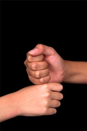 shaking hands kids - kids doing hand signs over black background Stock Photo - Budget Royalty-Free & Subscription, Code: 400-04454067