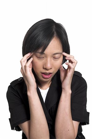 simsearch:400-04978521,k - young woman with headache over white background Stock Photo - Budget Royalty-Free & Subscription, Code: 400-04454092