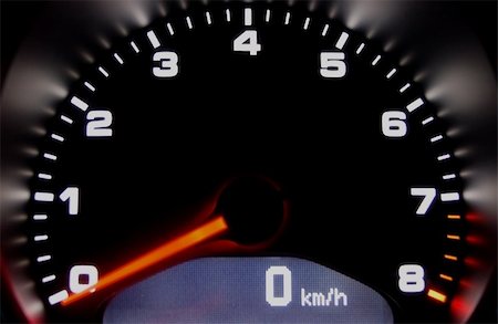 simsearch:400-08340626,k - Sportscar dashboard closeup with backlit speedometer Stock Photo - Budget Royalty-Free & Subscription, Code: 400-04454830