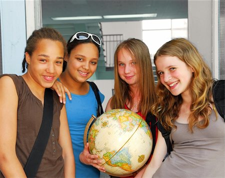 simsearch:400-05112397,k - Portrait of a group of young smiling school girls near school doors Foto de stock - Super Valor sin royalties y Suscripción, Código: 400-04455123