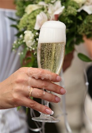 simsearch:400-03929021,k - Glass of champagne in a hand of the bride Stock Photo - Budget Royalty-Free & Subscription, Code: 400-04455323