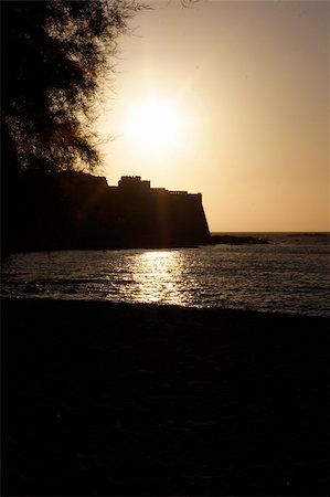 sunset over Algajola castle, corsica, mediterranean Stock Photo - Budget Royalty-Free & Subscription, Code: 400-04455687