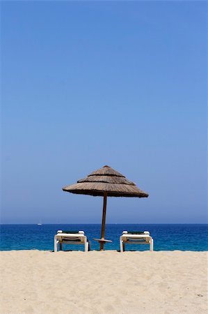 simsearch:400-06947087,k - sun lounger on empty sandy beach, corsica, mediterranean Stock Photo - Budget Royalty-Free & Subscription, Code: 400-04455682