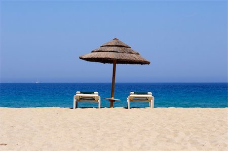 simsearch:400-06947087,k - sun lounger on empty sandy beach, corsica, mediterranean Stock Photo - Budget Royalty-Free & Subscription, Code: 400-04455683