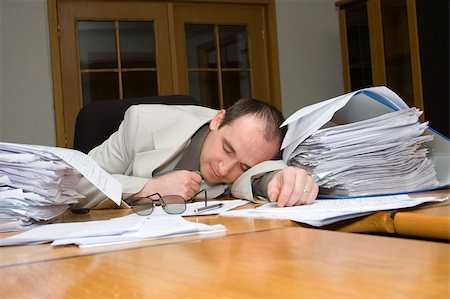 Businessman felt asleep late night in the office Stock Photo - Budget Royalty-Free & Subscription, Code: 400-04456231