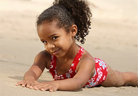 Cute little girl on a beach Stock Photo - Budget Royalty-Free & Subscription, Code: 400-04456951