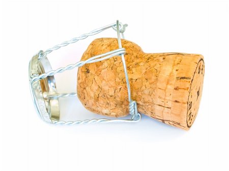 Champagne cork isolated on a white background Foto de stock - Super Valor sin royalties y Suscripción, Código: 400-04456953