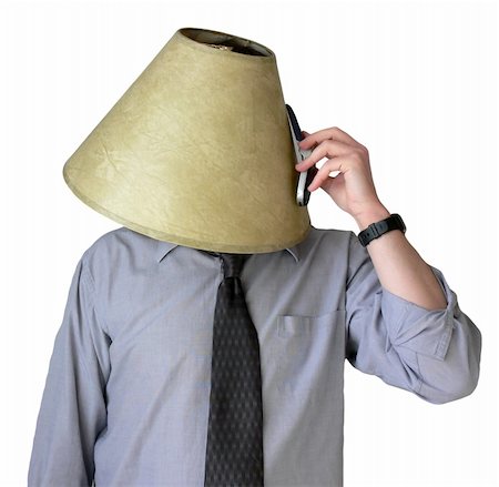 Businessman with a lampshade on his head, trying to talk on his cell phone. Taken with a Panasonic FZ30 Lumix. Stock Photo - Budget Royalty-Free & Subscription, Code: 400-04457003