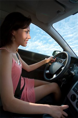 young woman driving a car Stock Photo - Budget Royalty-Free & Subscription, Code: 400-04457056