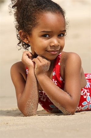 Cute little girl on a beach Stock Photo - Budget Royalty-Free & Subscription, Code: 400-04457074