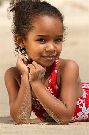 Cute little girl on a beach Stock Photo - Budget Royalty-Free & Subscription, Code: 400-04457075