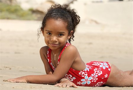 Cute little girl on a beach Stock Photo - Budget Royalty-Free & Subscription, Code: 400-04457073