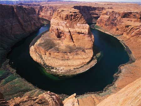 Horseshoe Bend in the Colorado River.  Located just south of Page Arizona. Also part of the Glen Canyon National Recreation Area Foto de stock - Super Valor sin royalties y Suscripción, Código: 400-04457185