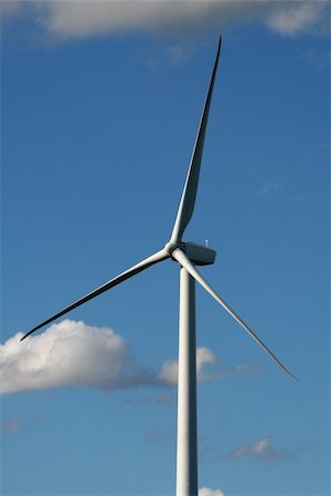 A close up of wind turbine shot against a blue sky. Stock Photo - Budget Royalty-Free & Subscription, Code: 400-04457218