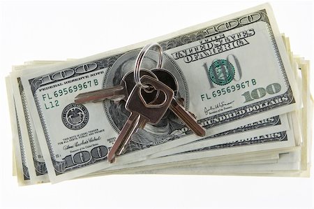 simsearch:400-05166790,k - Money and keys from an apartment on a white background Stock Photo - Budget Royalty-Free & Subscription, Code: 400-04457617