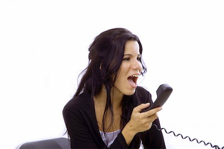 Angry receptionist woman yelling in the phone - isolated Stock Photo - Budget Royalty-Free & Subscription, Code: 400-04457641