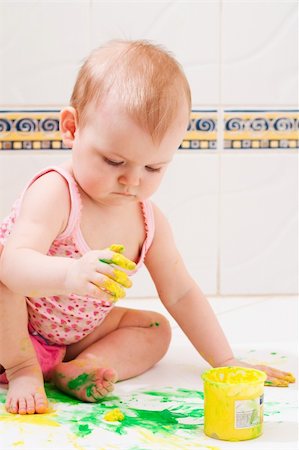 cute little baby playing with colorful paints Stock Photo - Budget Royalty-Free & Subscription, Code: 400-04458242