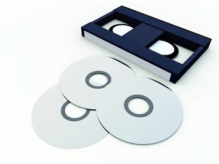 simsearch:400-04728971,k - An image of a video tape and a DVD/CD, showing both old and new media technologies. Stock Photo - Budget Royalty-Free & Subscription, Code: 400-04458424