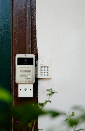 Security number pad and Intercom outside a shophouse in Singapore Stock Photo - Budget Royalty-Free & Subscription, Code: 400-04458444