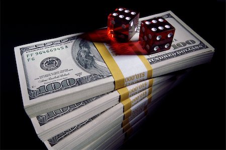 simsearch:400-07832442,k - Stack of Hundred Dollar Bills & Red Dice on a black background. Stock Photo - Budget Royalty-Free & Subscription, Code: 400-04458457