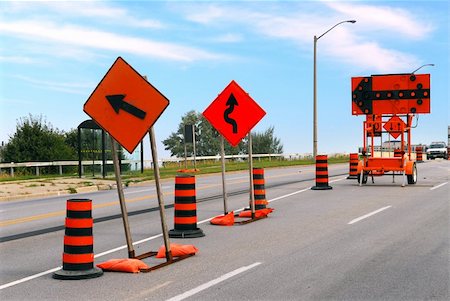 road construction barrier - Road construction signs and cones on a city street Stock Photo - Budget Royalty-Free & Subscription, Code: 400-04458640