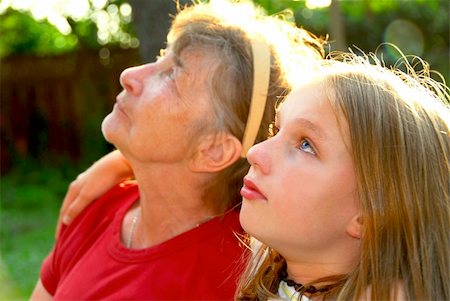 simsearch:649-08328527,k - Portrait of grandmother and granddaughter in summer park looking up Stock Photo - Budget Royalty-Free & Subscription, Code: 400-04458656