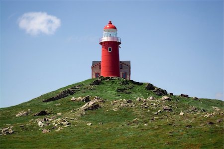 Saturated photograph of the lighthouse at Ferryland, Newfoundland, Canada. Stockbilder - Microstock & Abonnement, Bildnummer: 400-04458875