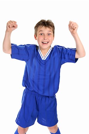 An elated boy celebrates with two fists in the air Stock Photo - Budget Royalty-Free & Subscription, Code: 400-04459141