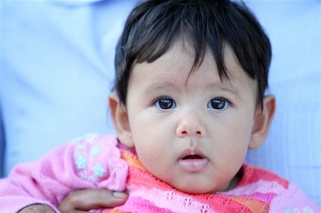 simsearch:400-04100917,k - Closeup of a very cute baby or toddler in bright pink clothings. Stock Photo - Budget Royalty-Free & Subscription, Code: 400-04459252