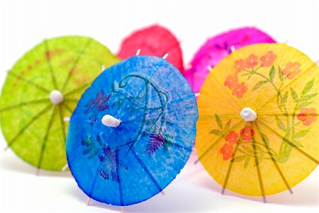 pastel cocktail umbrellas - paper parasols; differential focus Stock Photo - Budget Royalty-Free & Subscription, Code: 400-04450100