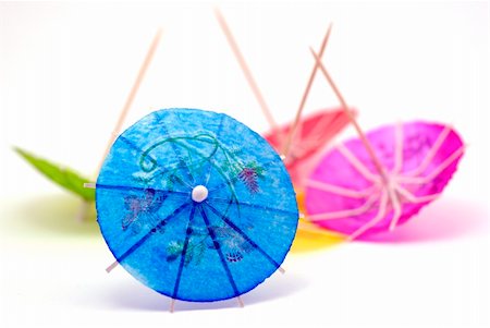 pastel cocktail umbrellas - paper parasols; differential focus Stock Photo - Budget Royalty-Free & Subscription, Code: 400-04450101