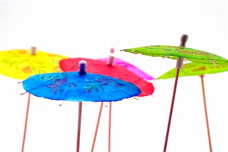 pastel cocktail umbrellas - paper parasols; differential focus Stock Photo - Budget Royalty-Free & Subscription, Code: 400-04450102