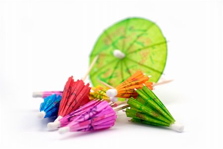 pastel cocktail umbrellas - paper parasols; differential focus Stock Photo - Budget Royalty-Free & Subscription, Code: 400-04450103