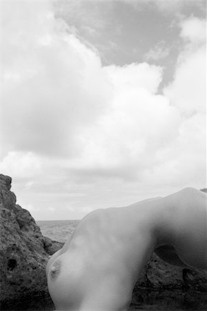 simsearch:400-04955255,k - Sexy nude Caucasian woman doing backbend on beach in Maui, Hawaii. Stockbilder - Microstock & Abonnement, Bildnummer: 400-04450399