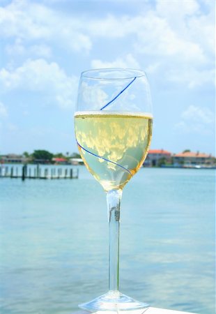Glass of cool white wine  on the coast Stock Photo - Budget Royalty-Free & Subscription, Code: 400-04450472