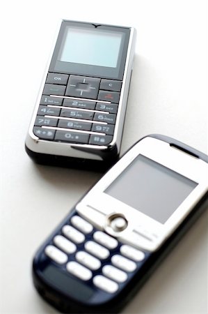 simsearch:400-04558697,k - Two modern mobile phones side by side Stockbilder - Microstock & Abonnement, Bildnummer: 400-04450598