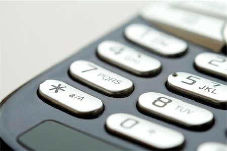 simsearch:400-04558697,k - A close up shot of mobile keypad under light Stockbilder - Microstock & Abonnement, Bildnummer: 400-04450599