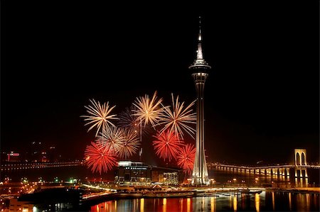 Celebration of New Year in Macau with fireworks beside the Tower Convention and Entertainment Center Stock Photo - Budget Royalty-Free & Subscription, Code: 400-04450607